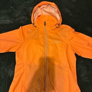 Columbia Vibrant Orange Windbreaker. Mark on the inside of hood.